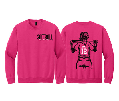 A pink sweatshirt with a graphic of a female softball player and the text "SOFTBALL" printed on the front.